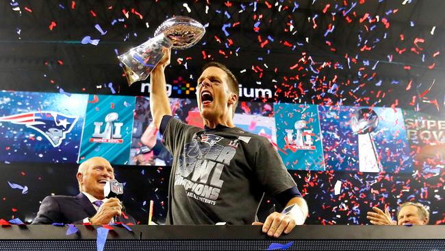 Tom Brady celebrates with the Vince Lombardi Trophy after beating Atlanta Falcons.