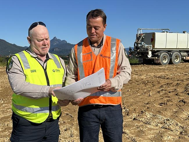 Tweed Shire Councilâs Team Leader - Rangers Kristian Pakula (right) and Ranger Alan Swift check concept plans on the site of the new Animal Pound and Rehoming Centre at South Murwillumbah.