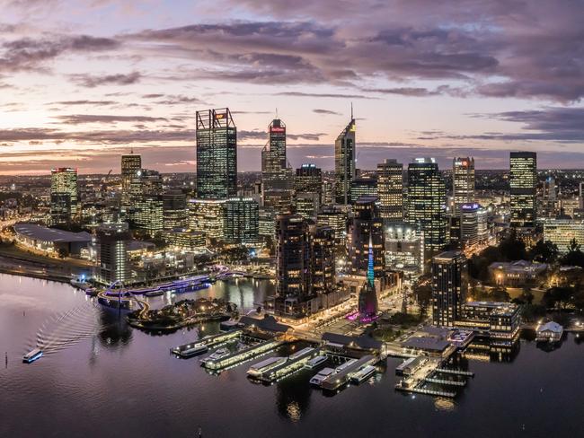 Aerial high angle drone view of Perth's CBD skyline with Elizabeth Quay in the foreground. Many mining companies are headquartered in PerthEscape 17 December 202348 Hours in - PerthPhoto: iStock