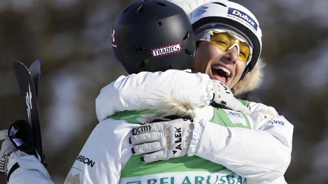 Lydia Lassila, right, celebrates with Dani Scott in Minsk.