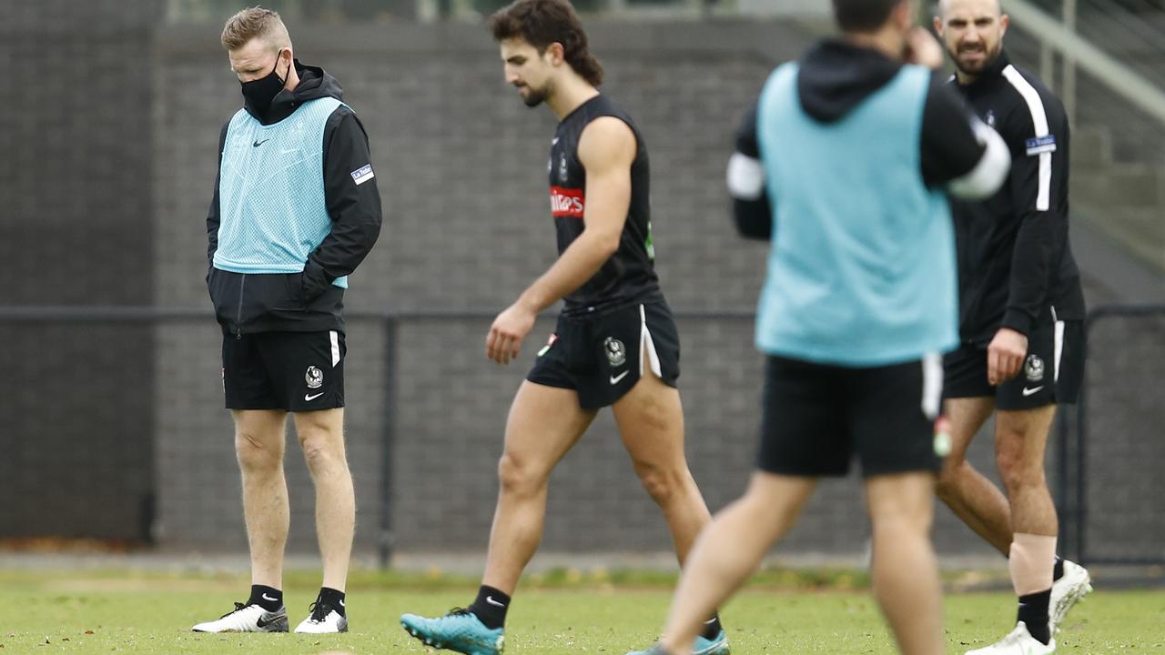 Collingwood coach Nathan Buckley wearing a mask at training last week. Picture: Darrian Traynor/Getty Images