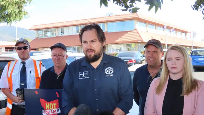 Rail, Bus and Tram Union state secretary Byron Cubit with Labor MP Meg Brown at Metro's Springfield Depot on Wednesday, March 19, 2025.