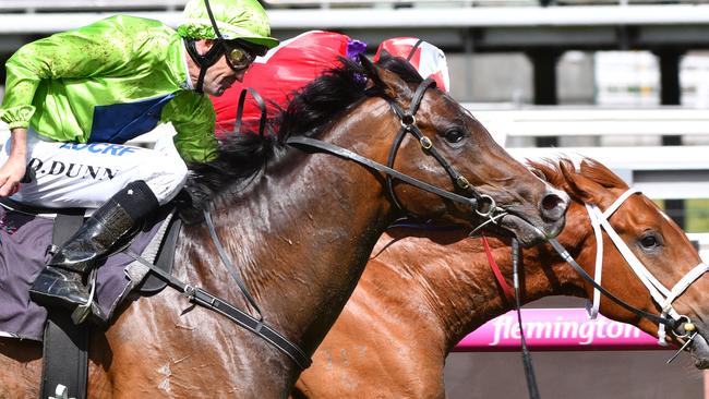 MELBOURNE, AUSTRALIA — SEPTEMBER 16: Dwayne Dunn riding Royal Symphony wins Race 2, during Melbourne Racing at Flemington Racecourse on September 16, 2017 in Melbourne, Australia. (Photo by Vince Caligiuri/Getty Images)