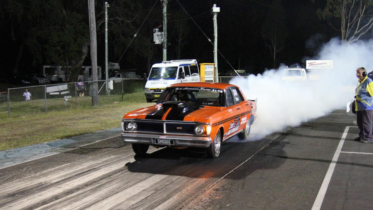 Noel 'Smudge' Smith does a strong burnout in his genuine 800 horsepower GT Falcon drag car at Benaraby dragway. Picture: Rodney Stevens