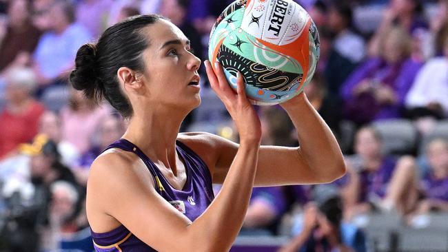 Emily Moore made the move from NSW to Queensland to join the Firebirds after almost giving up on a professional netball career. Photo: Getty