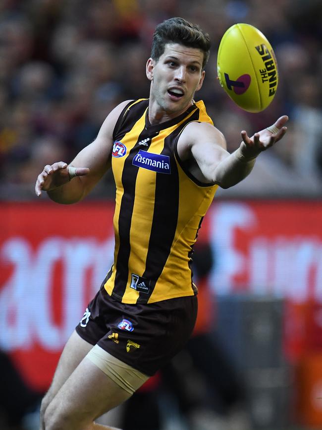 Hawthorn’s Luke Breust has the ball on a string. Picture: Julian Smith/AAP