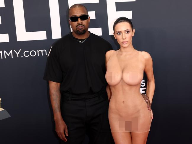 PIXELATED VERSIONS -  LOS ANGELES, CALIFORNIA - FEBRUARY 02: (EDITOR'S NOTE: Image contains nudity.) L-R, Kanye West and Bianca Censori attend the 67th Annual GRAMMY Awards on February 02, 2025 in Los Angeles, California.  (Photo by Matt Winkelmeyer/Getty Images for The Recording Academy)