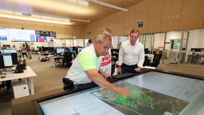 Premier Steven Miles and Gold Coast Mayor Tom Tate view storm damage from the Gold Coast disaster management centre. Picture: Supplied Premier's Department/Annette Dew