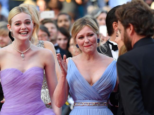 Tears fall down the Fargo star’s face as she walks the red carpet with the cast.
