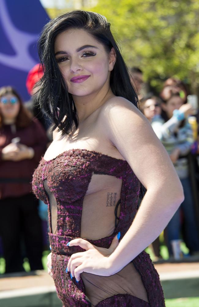 The actress’ tattoos were visible through the sheer panels of her dress.