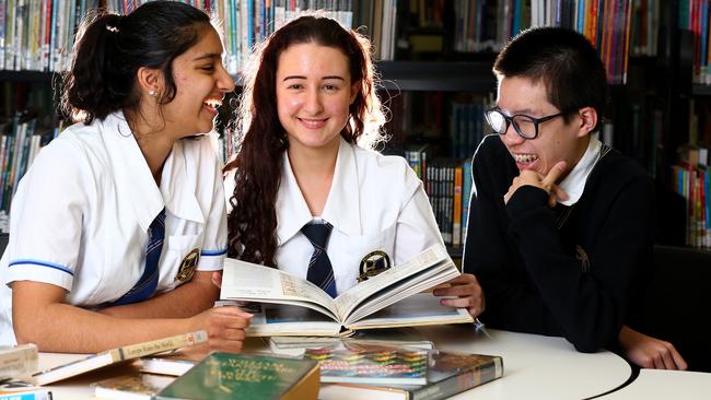 Runcorn State High School Year 11 students Jemimah Hunt, 16, Natalija Bradic 16, and Jerry Zhu, 15, will be part of the first group of Queensland students to sit external exams in almost 50 years. Picture: Adam Head