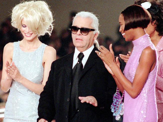 The late Karl Lagerfeld, centre, with Claudia Schiffer and Naomi Campbell in 1996. Picture: AP