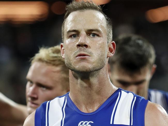 GEELONG, AUSTRALIA - APRIL 18: Josh Walker of the Kangaroos reacts after a loss during the 2021 AFL Round 05 match between the Geelong Cats and the North Melbourne Kangaroos at GMHBA Stadium on April 18, 2021 in Geelong, Australia. (Photo by Dylan Burns/AFL Photos via Getty Images)