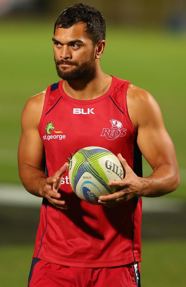 Karmichael Hunt looks on during a Queensland Reds training session at Ballymore on Thursday night.