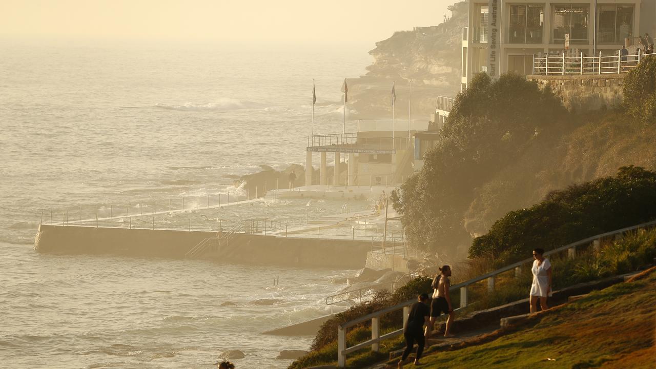 Smoke covers Bondi Beach in Sydney this morning. Picture: Getty Images