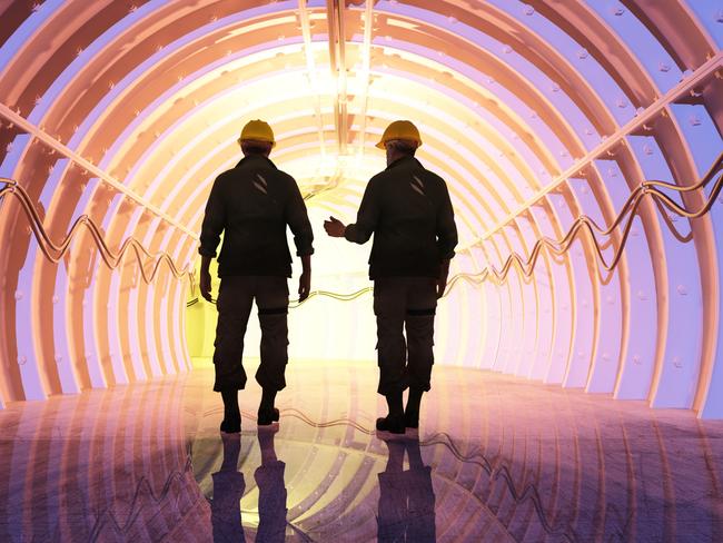 Silhouette of workers in the tunnels. Picture: istock