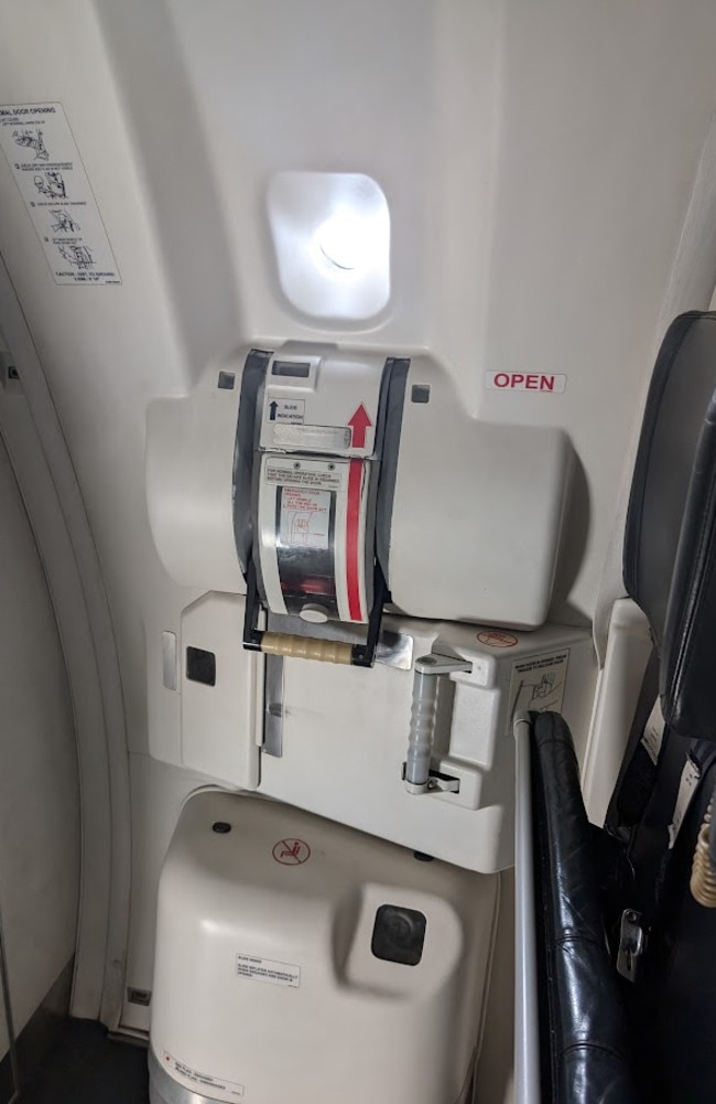 This is the plane’s emergency exit door that two passengers, on separate occasions, tried to open. Picture: news.com.au