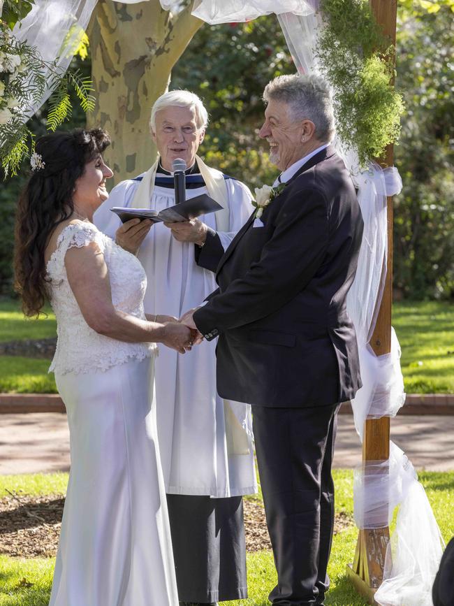 Chris Harwood marying his bride Rita Harwood-Romeo in the Rose Garden at Sunnybrae. Picture: Kelly Barnes