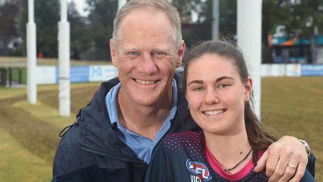 Nathan Burke with daughter Alice, when she was a 16-year-old AFLW prospect. Picture: Josie Hayden