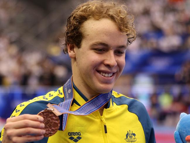 FUKUOKA, JAPAN - JULY 30: Bronze medallist Sam Short of Team Australia poses during the medal ceremony for Men's 1500m Freestyle Final on day eight of the Fukuoka 2023 World Aquatics Championships at Marine Messe Fukuoka Hall A on July 30, 2023 in Fukuoka, Japan. (Photo by Adam Pretty/Getty Images)