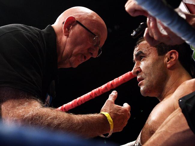 MELBOURNE, AUSTRALIA - JUNE 24:  Johnny Lewis (L) speaks to Jeff Fenech during his welterweight fight against Azumah Nelson at the Vodafone Arena on June 24, 2008 in Melbourne, Australia.  (Photo by Quinn Rooney/Getty Images)