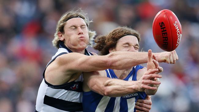 Mark Blicavs spoils North Melbourne's Ben Brown on his way to keeping him goalless on Saturday. Picture: Michael Klein