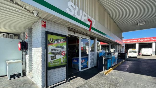 The Alice Springs Puma service station missing its front door after it was smashed overnight. Picture: Jasmine Burke