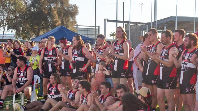 East Mackay Saints celebrate their third premiership in as many years and will now look to make it four after a strong start to 2023. Picture: Marty Strecker