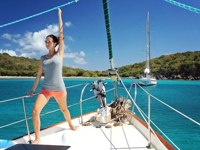 Jessica doing a spot of yoga on the boat at Sint Maarten in the East Caribbean.