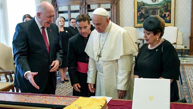 Governor-general Peter Cosgrove presents Pope Francis with a Socceroos jersey. Picture: AFP