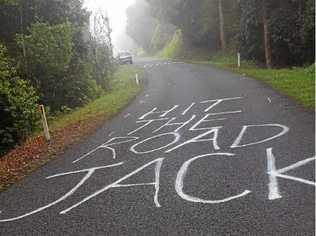 Graffiti on Rowlands Creek Rd in protest against water extraction. Picture: Aisling Brennan