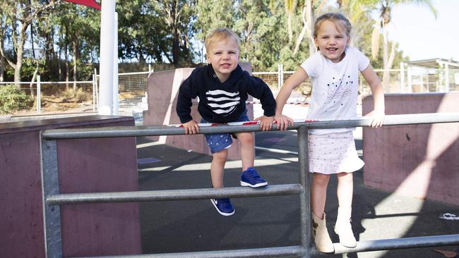 Peri Olding and Oliver Olding posing at a playground at Redcliffe Parkour Park, Woody Point. (AAP Image/Attila Csaszar)