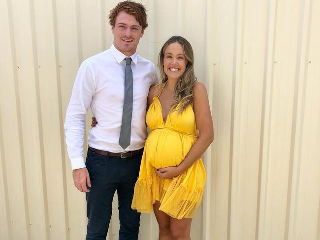 Gary Rohan and wife Aimee late in her pregnancy.