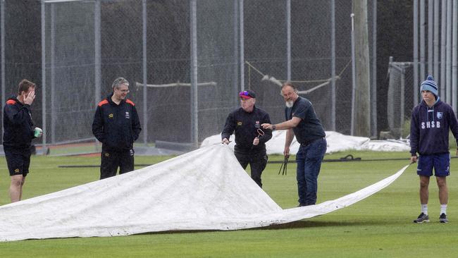 Overnight rain delayed the start of the match between University South Hobart-Sandy Bay at Queenborough Oval. Picture: Chris Kidd