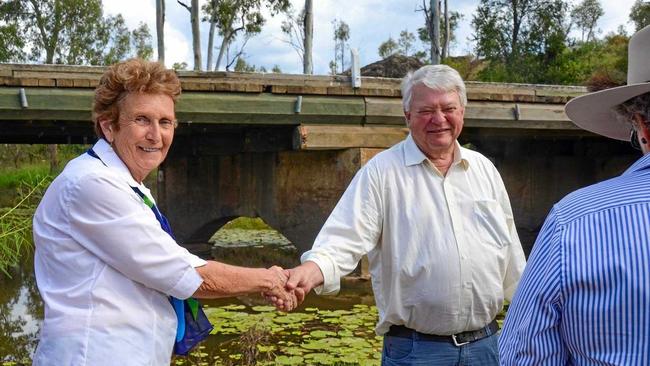 SHAKE ON IT: Deputy Mayor Faye Whelan has Member Flynn Ken O'Dowd shake on a commitment to get the North Burnett a new bridge. Picture: Felicity Ripper