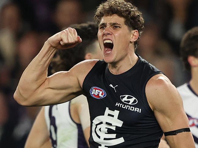 MELBOURNE, AUSTRALIA - JUNE 25: Charlie Curnow of the Blues celebrates after scoring a goal during the round 15 AFL match between the Carlton Blues and the Fremantle Dockers at Marvel Stadium on June 25, 2022 in Melbourne, Australia. (Photo by Robert Cianflone/Getty Images)