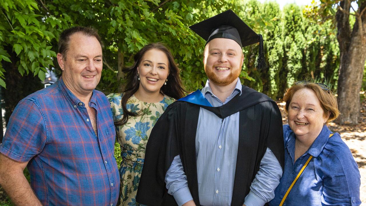 Bachelor of Science graduate Micheal Thouard with family (from left) Sean Thouard, Georgia Fyfe and Donna Thouard at the UniSQ graduation ceremony at Empire Theatres, Wednesday, December 14, 2022.