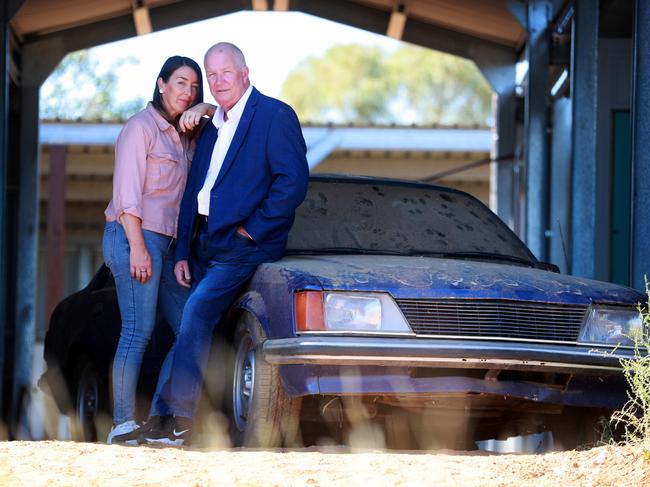 Ex detective and cold case specialist Damian Loone and Rachelle Childs sister Kristy stand with Rachelle's Commodore. Picture: Jeff Darmanin