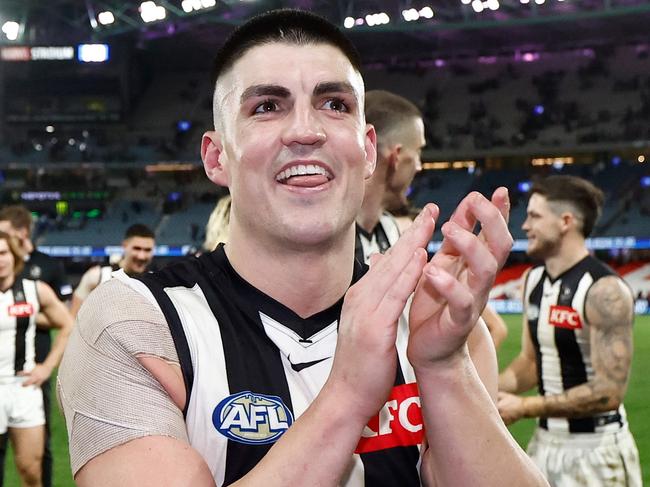 MELBOURNE, AUSTRALIA - JUNE 16: Brayden Maynard of the Magpies celebrates after his 200th match during the 2024 AFL Round 14 match between the North Melbourne Kangaroos and the Collingwood Magpies at Marvel Stadium on June 16, 2024 in Melbourne, Australia. (Photo by Michael Willson/AFL Photos via Getty Images)