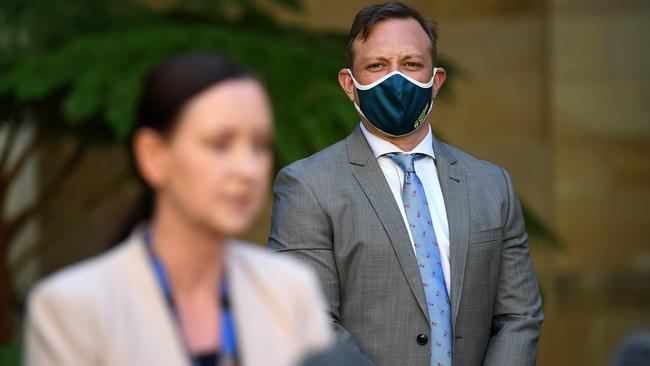 Acting Queensland Premier Steven Miles watches Health Minister Yvette D'Ath during a press conference to provide a Covid update at Parliament House in Brisbane. Picture: NCA NewsWire/Dan Peled