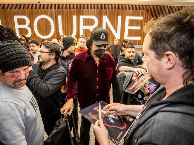 Gene Simmons signs autographs for fans upon arrival at Melbourne Airport to begin the Australian leg of the End of the Road Tour. Picture: Jake Nowakowski