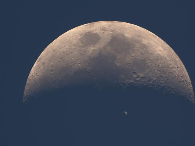Insight Astronomy Photographer of the Year 2017 shortlist selection: ISS Daylight Transit . Picture: Dani Caxete (Spain) The International Space Station (ISS) whizzes across the dusky face of the Earth’s natural satellite, the Moon, whilst photographed in broad daylight. Shining with a magnitude of -3.5, the ISS was illuminated by the Sun at a height of 9º on the horizon. Like the Moon, the ISS receives solar rays in a similar way during its 15 orbits of the Earth a day, making it possible to see it when the Sun is still up. This is a real shot, with no composite or clipping in the process. Madrid, Spain, 2 April 2017