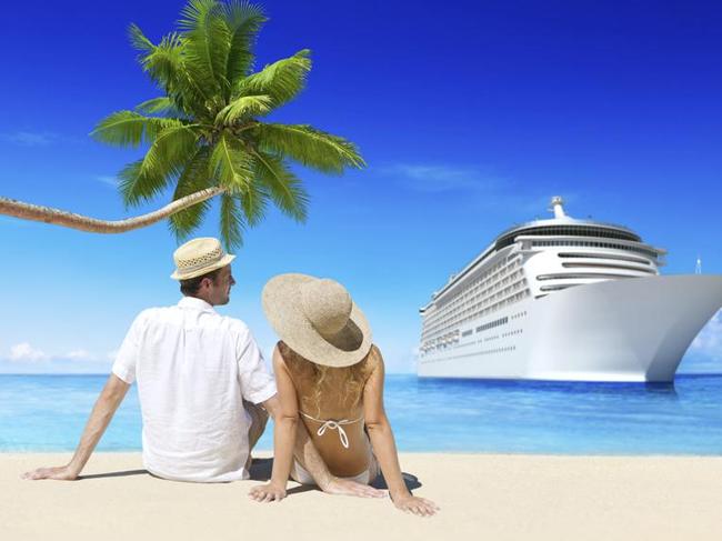 Couple on the Beach with Cruise Ship