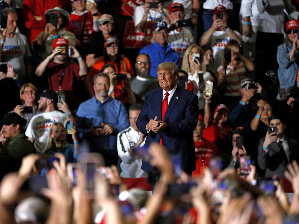 Former US President Donald Trump arrives for a Save America rally. Not pictured are “submerged” Trump supporters fearful to be identified. Picture: AFP