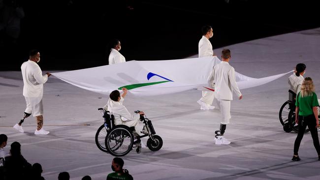 The Paralympic flag is brought in to the stadium during the opening ceremony.