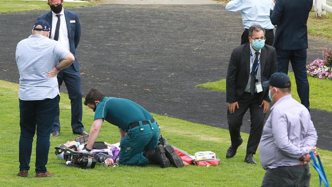 Justin Huxtable is worked on in the mounting yard at the Gold Coast after being kicked. Picture: Mike Batterham