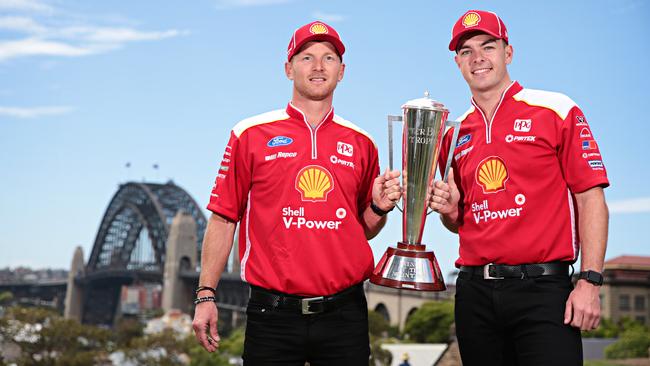 Alex Premat and Scott McLaughlin pose with the Peter Brock trophy at Observatory Hill in Sydney following their Bathurst 1000 victory. Picture: Adam Yip