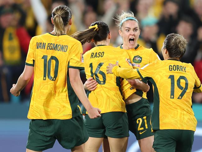 SYDNEY, AUSTRALIA - AUGUST 07: Hayley Raso (C) of Australia celebrates with teammates after scoring her team's second goal during the FIFA Women's World Cup Australia & New Zealand 2023 Round of 16 match between Australia and Denmark at Stadium Australia on August 07, 2023 in Sydney, Australia. (Photo by Matt King - FIFA/FIFA via Getty Images)