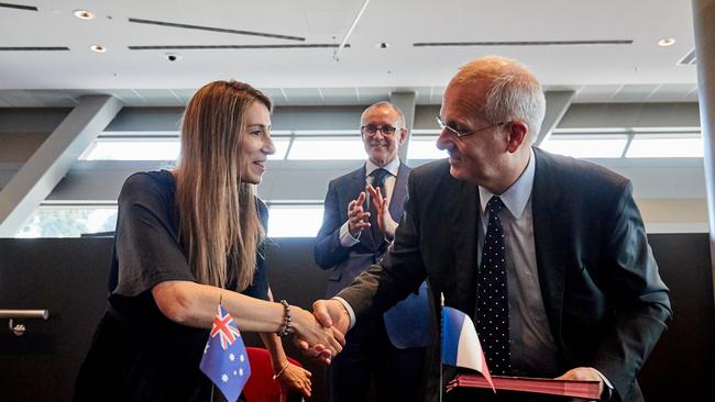 Flavia Tata Nardini and CNES President Jean Yves Le Gall sign a memorandum of understanding for CNES to support Fleet Space at the 2017 Space Conference in Adelaide. Picture: AAP/Matt Loxton