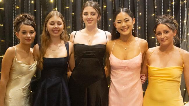 Lily Walis, Soleil Knight, Hataya Kereopa, Hana Lerompte and Coby Mathers at the Maroochydore State High School formal 2023.